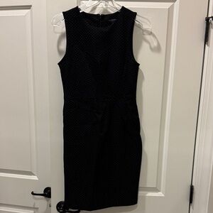 Elegant Black and White Polka Dot Sleeveless Dress